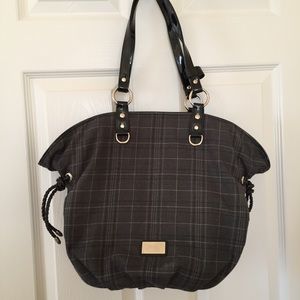 Convertible beijo bag with snap out interior.